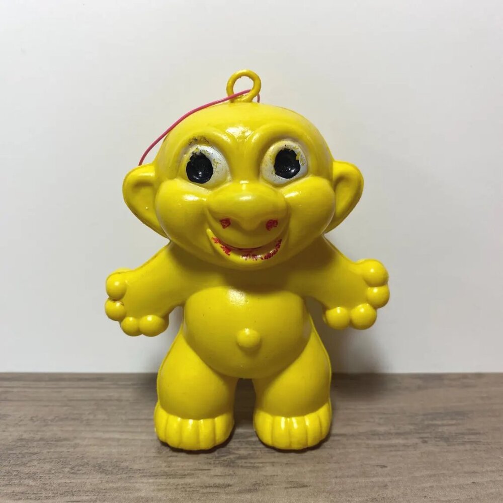 Vintage Troll Doll Yellow Hollow Plastic Hong Kong Tab Loop